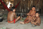 Yanomami family around their hearth