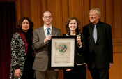 Anne-Marie O'Reilly & Henry McLaughlin receiving the award on behalf of 2012 Laureate Campaign Against Arms Trade (CAAT)