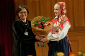 Deniz Ataç receiving the award on behalf of 2012 Laureate Hayrettin Karaca