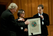 Deniz Ataç receiving the award on behalf of 2012 Laureate Hayrettin Karaca 